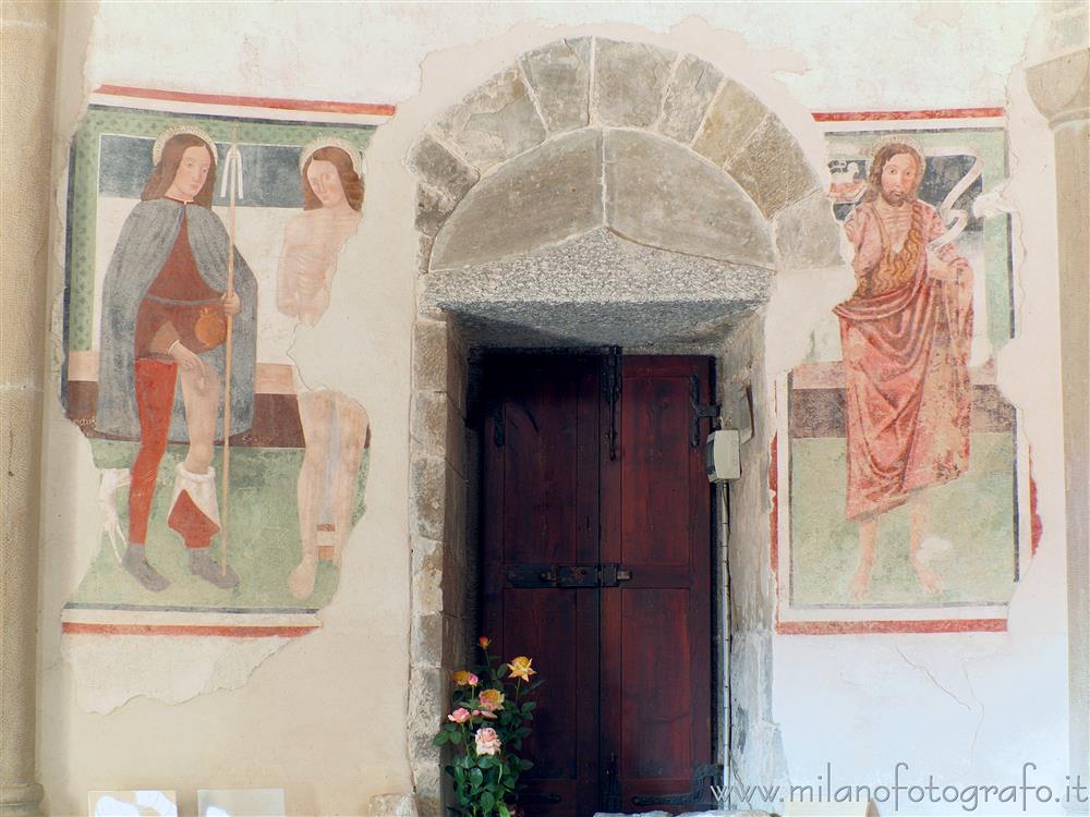 Oggiono (Lecco, Italy) - Door toward the church inside the Baptistery of San Giovanni Battista